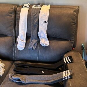 PRE OWNED AND WORN CONDITION 6 PAIRS OF LONG SOCCER SOCKS